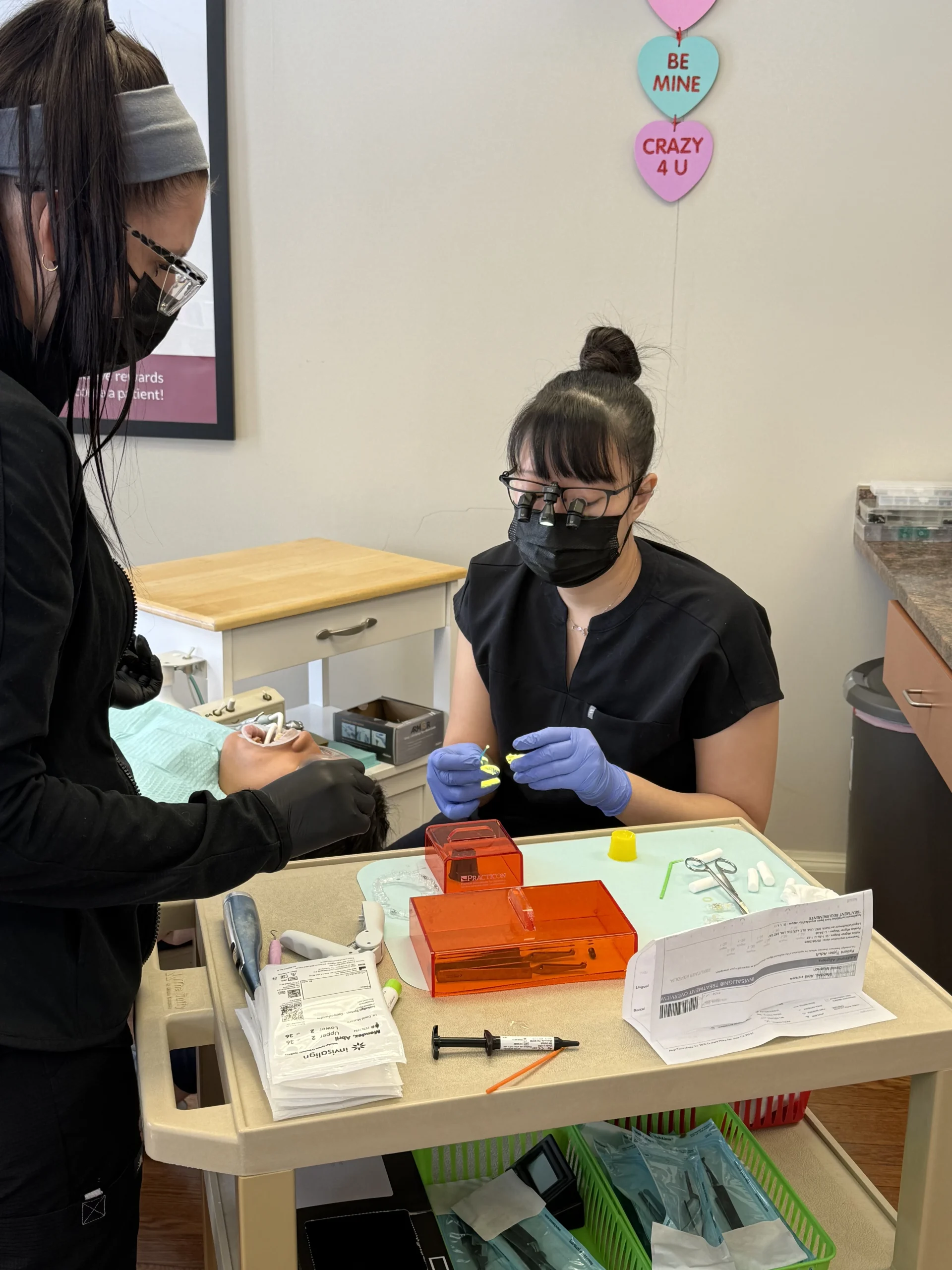Dr. Lee and team treating a patient at Muench Orthodontics